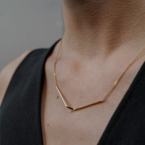 Line large gold plated necklace